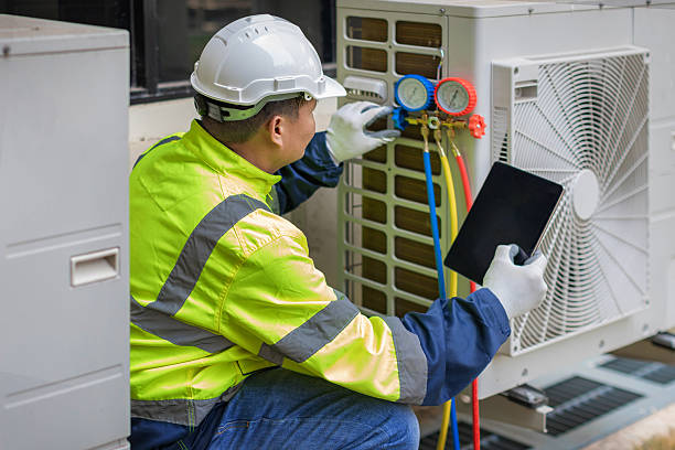 Professional Hvac technician working in Roosevelt, NY